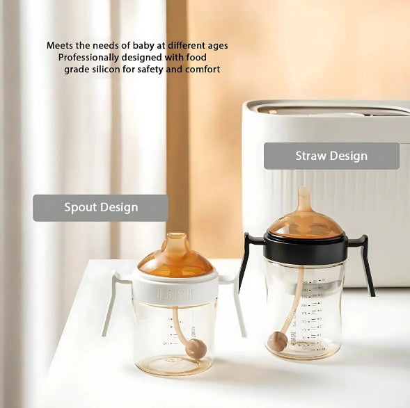 Two baby bottles with spout and straw designs on a white surface.