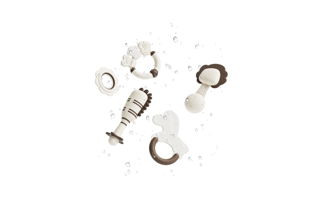 Set of baby teething toys with brown and white design on a white background