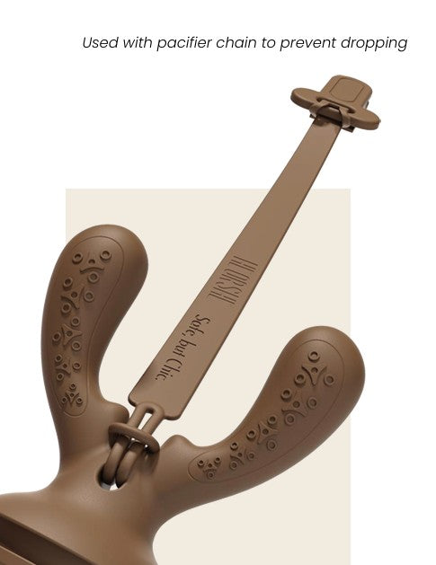 Brown pacifier holder with chain on a white background