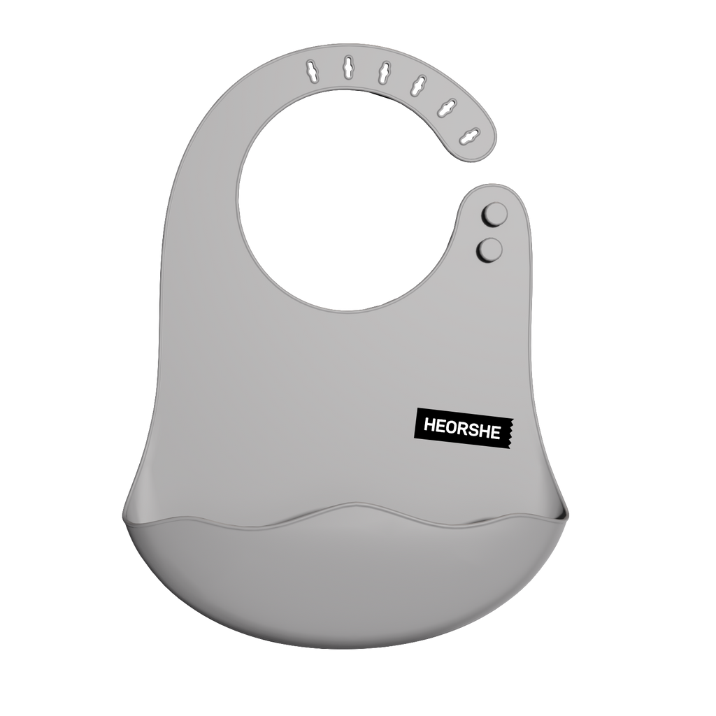 Gray baby bib with 'HEORSHE' branding on a white background